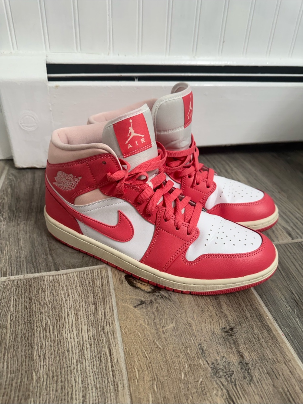 Jordan 1 Mid Women’s Sneakers in Pink and White